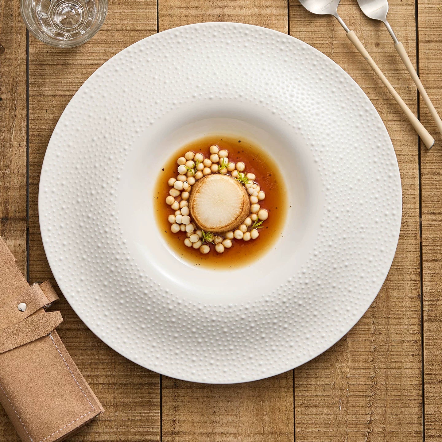 Sesame Point 12-Inch Round Well Plate – Artisanal Textured Fine Ceramic