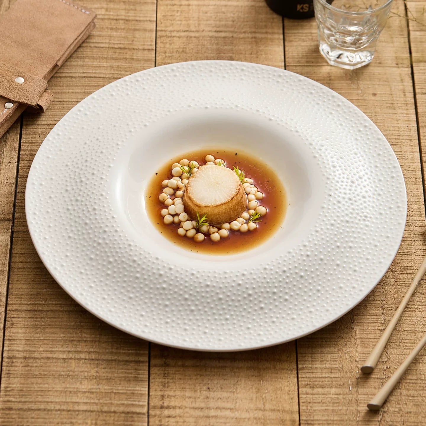 Sesame Point 12-Inch Round Well Plate – Artisanal Textured Fine Ceramic